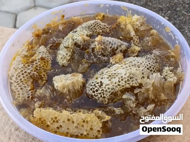 للبيع عسل بشمعه بطويق جبلي مال سنه ما شاء الله برم صافي ومضمون