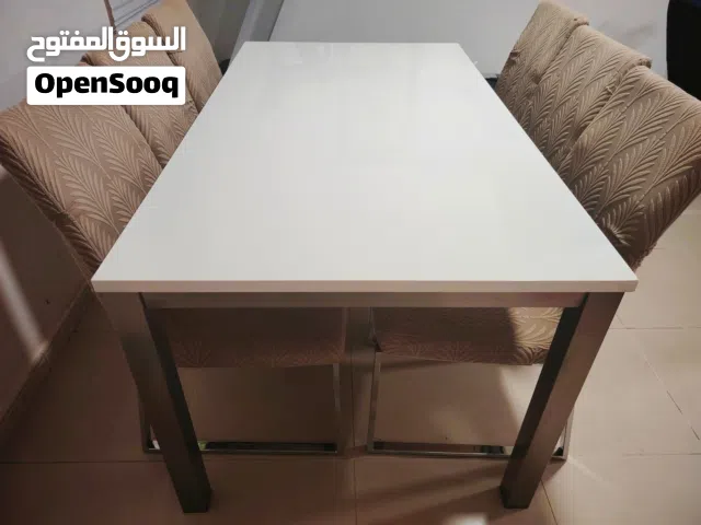 Beautiful Metallic Frame Dining Table and 6 chairs for sale In Madina Sultan Qaboos