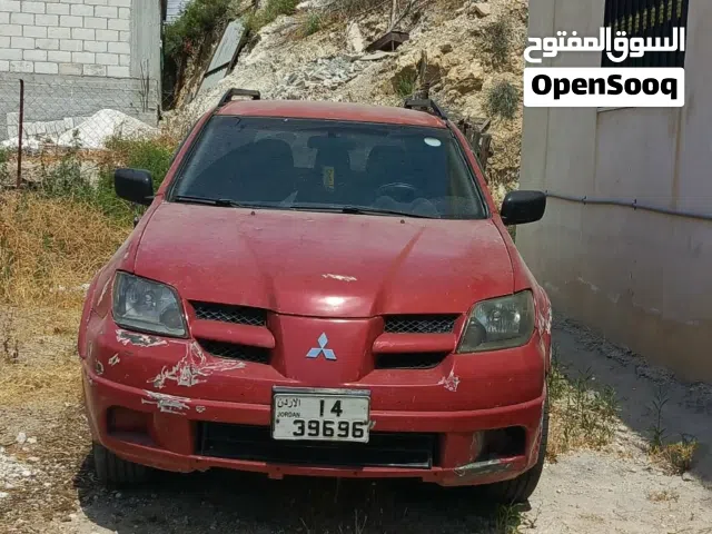2003 ميتسوبيشي اوتلاندر GLS