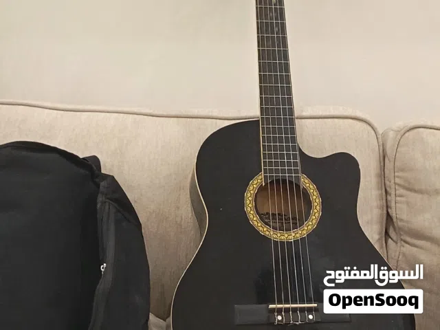 جيتار احترافي اسباني مع أوتار جديدة