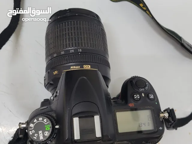 كاميرا Nikon D7000 مع حامل للكاميرا  كارت ميموري  شنطه للحامل وشنطه للكاميرا  ادوات تنظيف الكاميرا
