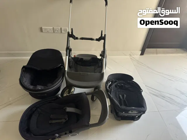 STOKKE twin stroller with three adjustable seats