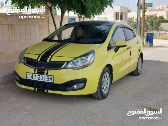 كيا ريو 2016 لون اصفر مميز فحص كامل بسعر مغري قابل للبدل
