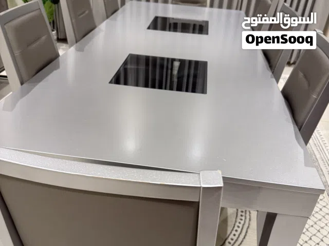 طاوله طعام ل 8 اشخاص