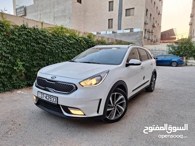 كيا نيرو هايبرد 2018 وارد كوري أبيض لؤلؤي  فحص كامل7جيد جمرك جديد
