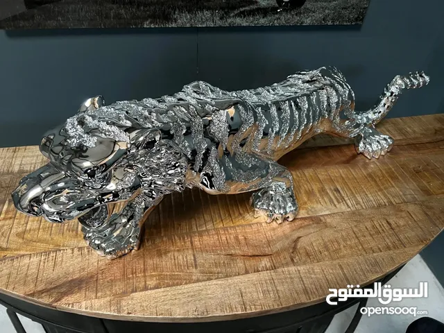 Silver tiger statue