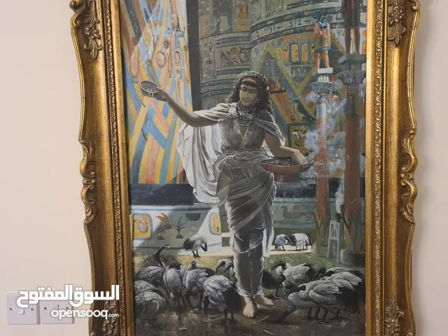 لو حه فنيه مع برواز فخم...رسم يدوي اسم اللوحه..feeding the sacred ibis in the hall of karnak