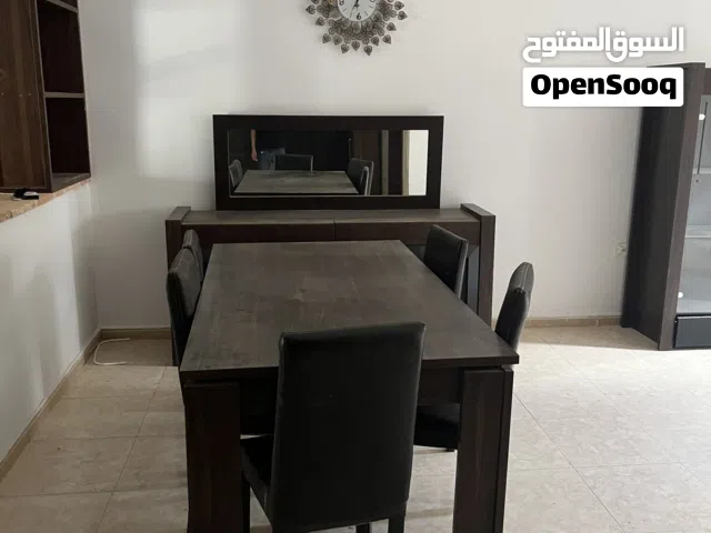 غرفة طعام..طاولة وثلاث بوفيهات وطاولة تلفزيون