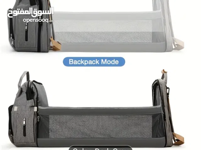 2 في 1 شنطه وسرير للطفل جديده باللون الوردي