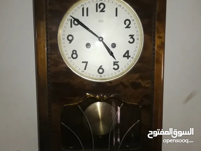 ساعة حائط بندول