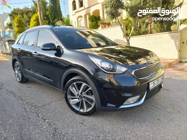 كيا نيرو موديل 2018 لون أسود فل كامل أعلى صنف