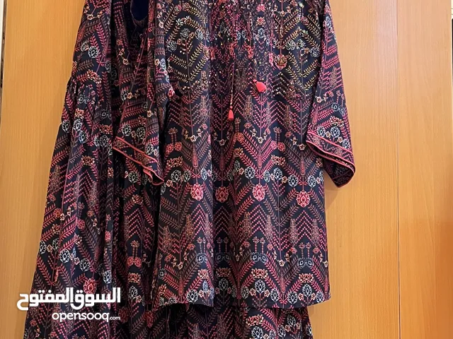Pleated pants, work on top,base black wth red and brown color print, anyone from size L-xxl can wear
