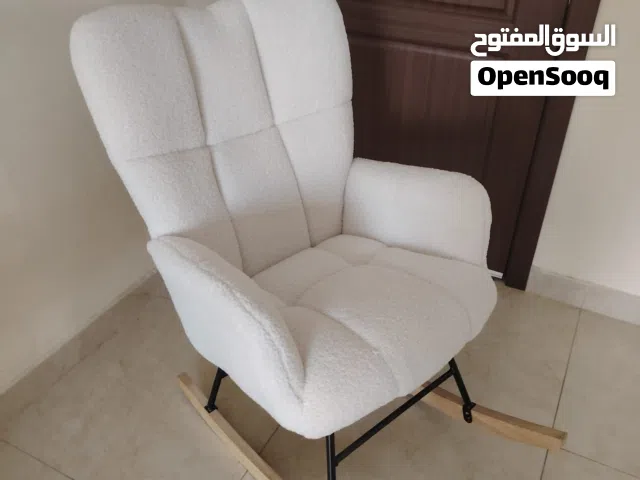 كرسي هزاز  لونه ابيض