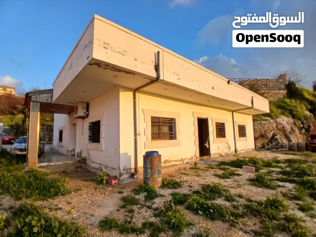 بيت مع مزرعة على دونم 225م بأجمل مواقع ماحص وباطلالة جدا خلابه للبيع بسعر مميز