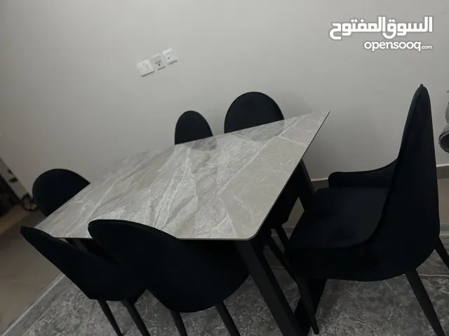 Elegent Dining set 6 seaters with marble table top and plush chairs