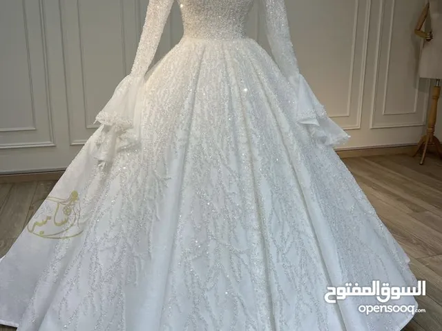فستان عروس أبيض شرعي بسعر مُغري