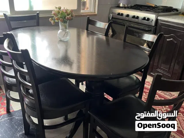 طاولة سفرة مع كراسيها