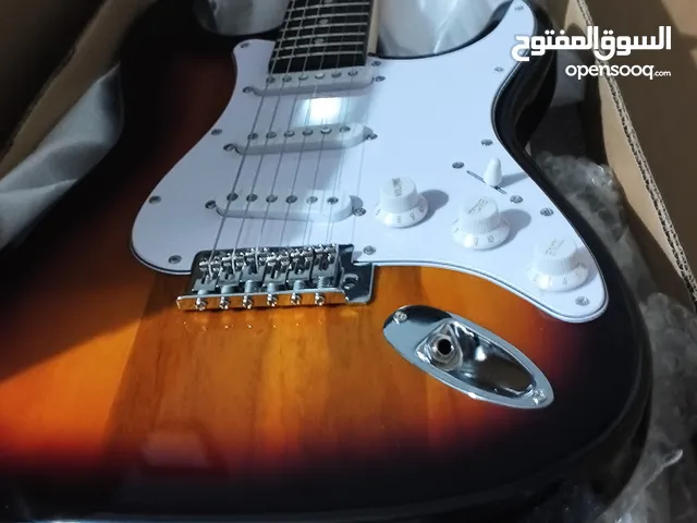 New electric guitar with bag and cord