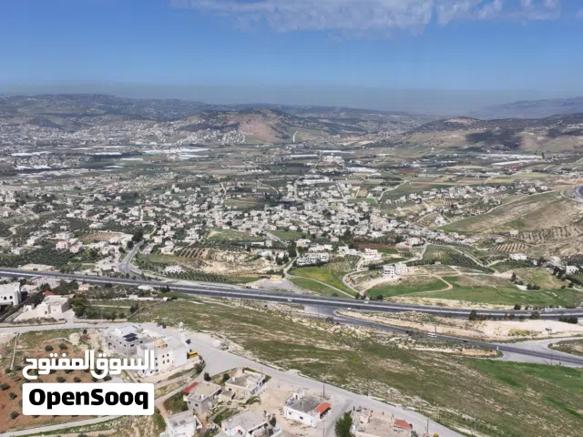 قطعة أرض تبعد فقط 500 متر عن شارع الاردن (أم رمانة) سكن ب من المالك مباشرة