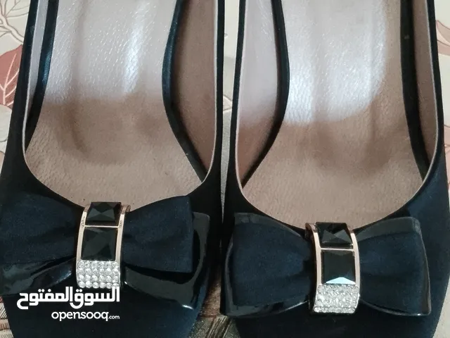 Black With Heels in Amman
