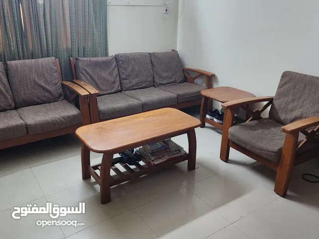 Wooden Sofa Set 3+2+1 and tables in good condition.