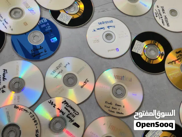 مجموعة كبيرة أقراص DVD (مسلسلات، أفلام، وألعاب كمبيوتر)