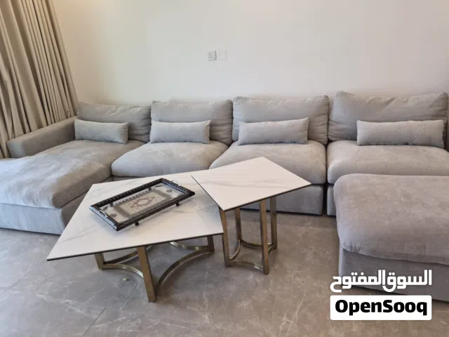Almost new sectional and coffee tables