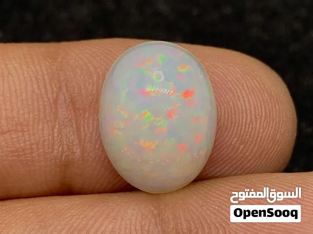أوبال أثيوبي أبيض فل فاير طبيعي مع اثبات فحص المختبر  natural full fire Ethiopian opal stone