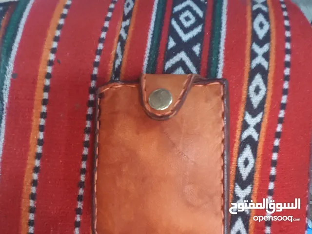 محفظة من الجلد الطبيعي عمل يد