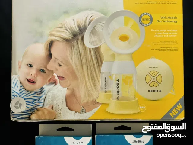 Urgent sale new Medela Swing Maxi Flex Double Electric Breast Pump + 2 Packs Breastmilk Storage Bags