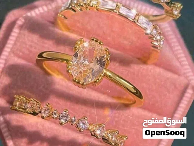خواتم باللون الذهبي مع مجوهرات بنك