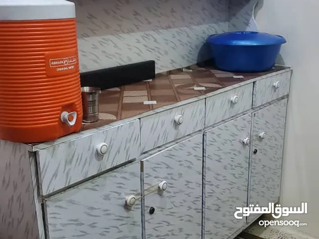 دولاب مطبخ خشب ملبس مترين نظيف جداً
