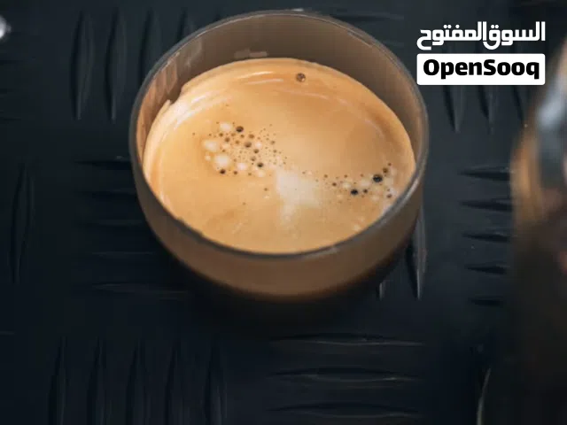ماكينة إسبريسو يدوية بالضغط.