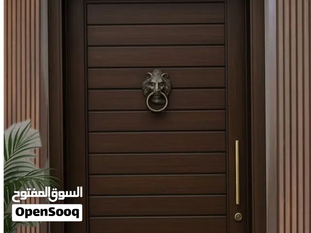 دهان ابواب حديد وخشب