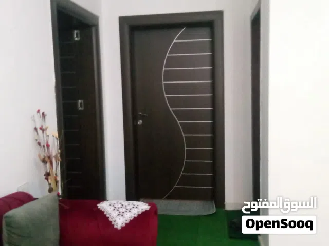 أرضي تشطيب اللهم بارك _ تاجوراء _ سيرتي _ بالقرب من المسجد و المدرسة