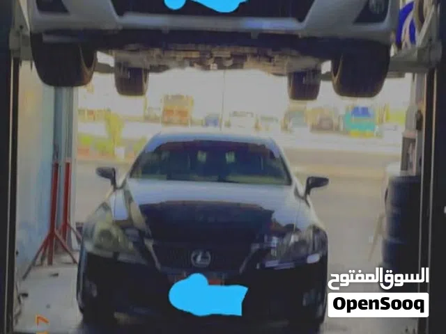 للبيع محل تصليح وميزان سيارات في العين مع الرخصة والمعدات