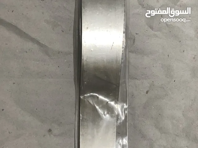 خافض لسان معدنى