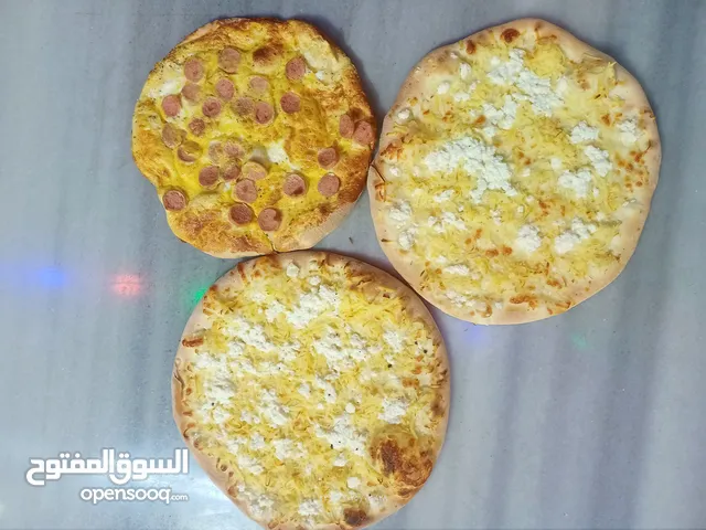 محل بيتزا ومعجنات وسناك للبيع بسعر مغري
