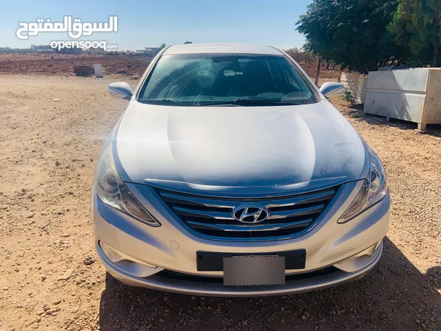 هونداي سوناتا هايبرد (كهرباء +بنزين) كرت 2011 وارد كوري ،حالة السيارة ممتازة ولا غلطة