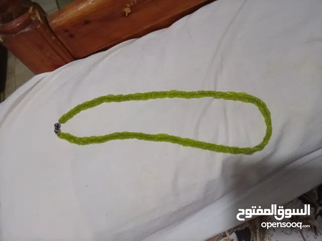 عقد خرذ حريمى اخضر اللون ب 50 جنيه فقط