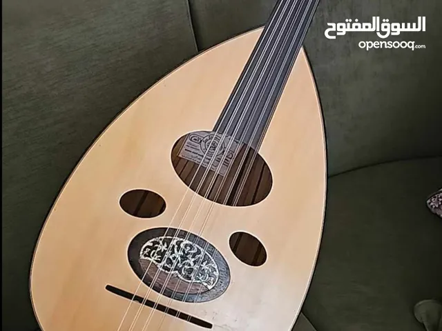 عود سورى احترافي سحب من اجود الأخشاب اوتار اصلى وشنطه وريشه