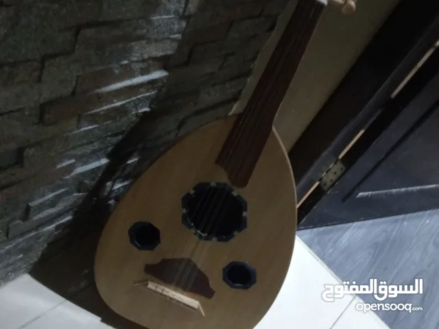 عود للمبتدئين موجو شنطه العود وريشاه لايجي الا اصامل