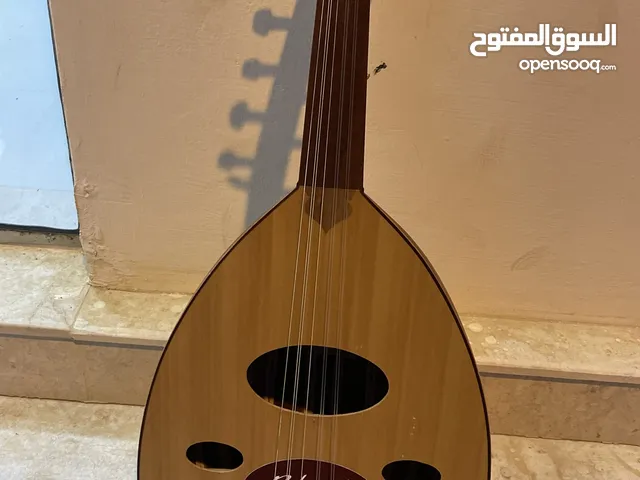 عود مستعمل وتر واحد مشطور وخب مكسور