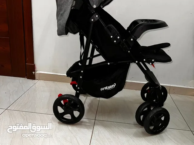 عربة أطفال و سرير هزاز كهربائي