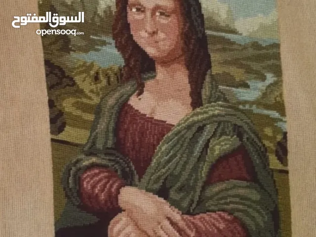 لوحة الموناليزا ديفينشي لوحة الموناليزا ديفنشي من خيط الصوف عمل بسيلا عدد الغرز 50937