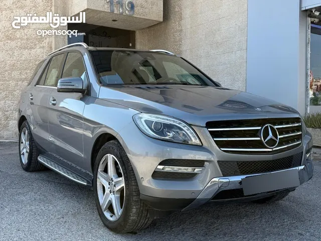 مرسيدس ML 350 موديل 2013 بحالة ممتازة! فرصة اقتناءSUV من الوكالة تجمع بين الأداء والاناقة لمالك واحد