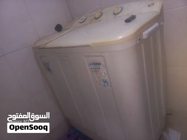 غساله ملابس تشتغل نشافه بس