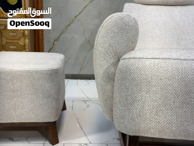 كرسي هزاز مع طابوريه