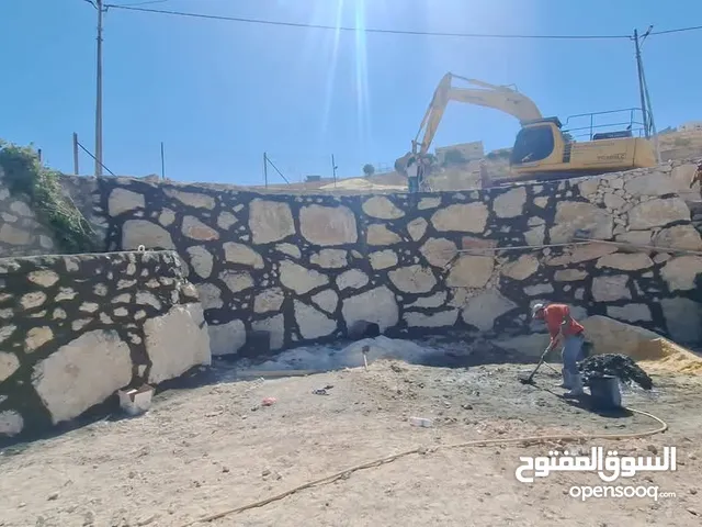 استصلاح اراضي زراعيه بناء سناسل حجريه سلاسل حجريه تشييك اراضي تشييك مزارع تنسيق حدائق وبناء