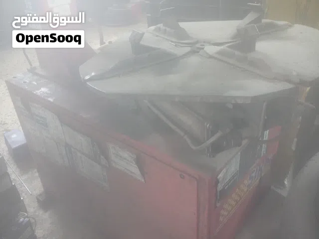 ماكينة فك وتركيب لإطارات